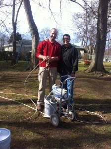 Remnant Fellowship men helping paint